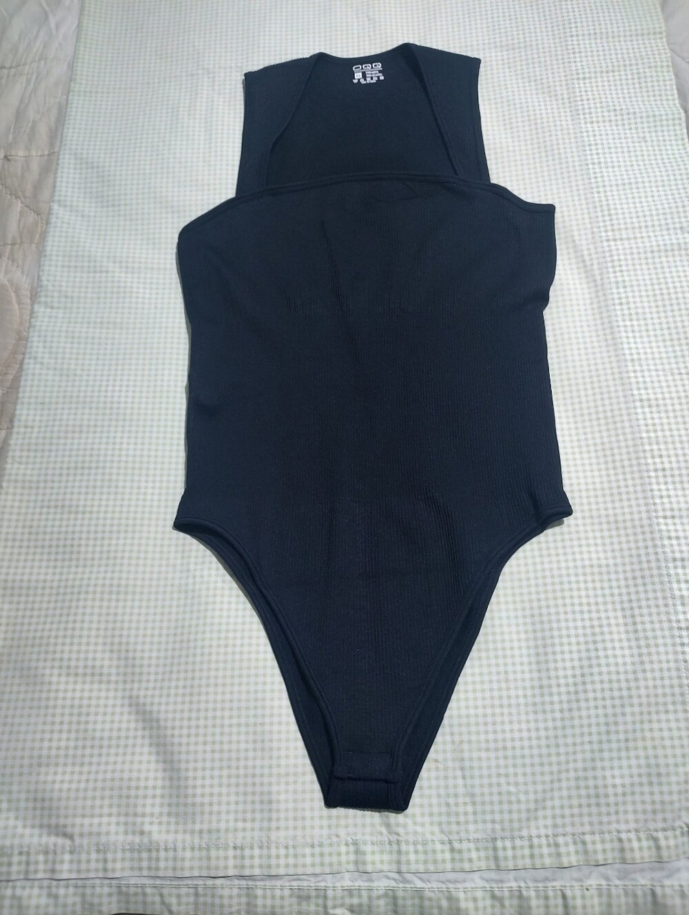 Women's Black Ribbed One-Piece Bodysuit